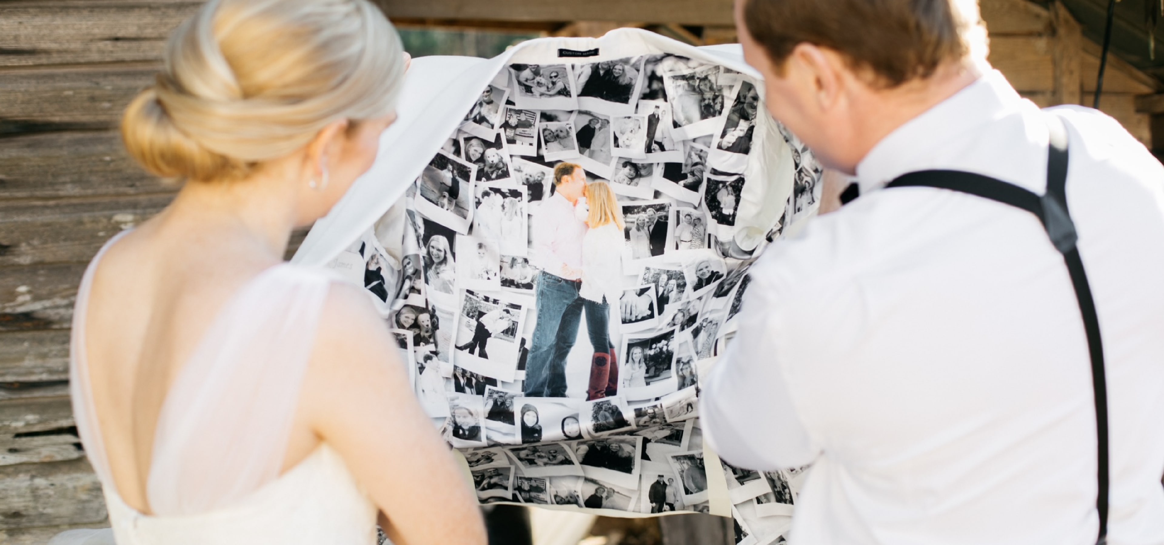 A couple looking at a custom lining featuring pictures of them